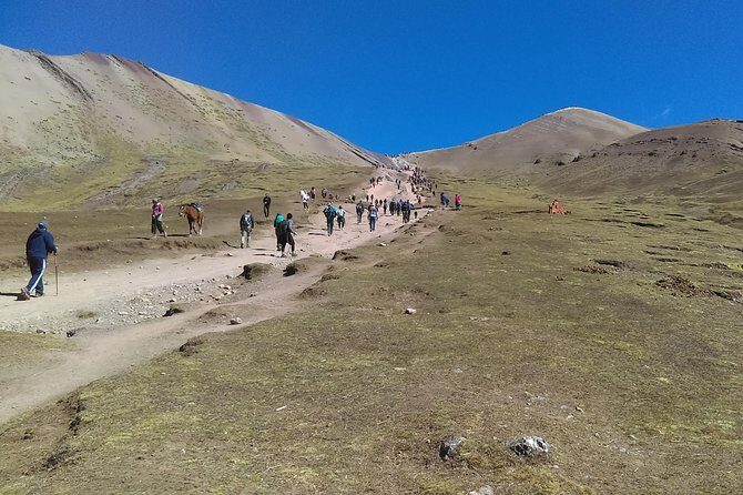 1-Day Tour Rainbow Mountain from Cusco - Summit views: Rainbow colors, Ausangate, and wildlife possibilities