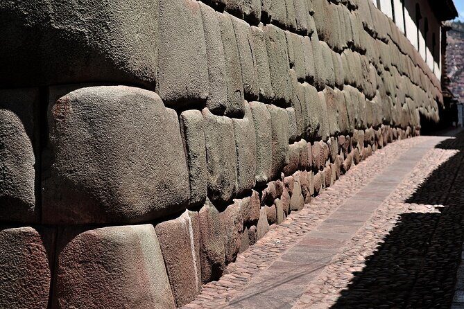 Cusco: Cultural & Historic Walking Tour with Local Drinks - Hatun Rumiyoq Street: the stone details that make you look smarter