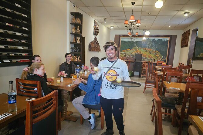 Cusco: Historic Walking Tour with Pisco Sour and Local Music - Group size, pace, and your calf budget