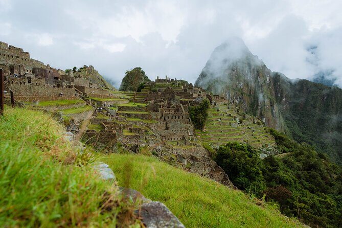 Full Day Machu Picchu Tour by Train Magical Inca City Adventure - Cusco to Ollantaytambo by car, then the train to Aguas Calientes