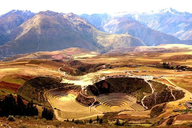 Half Day Guided Tour to Maras Salt Mines and Moray Terraces - Chinchero: terraces you can see working, and textiles you can watch being made