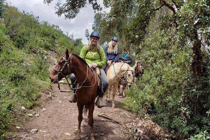Hidden Inca Temples – Full day Horseback Riding Tour – Cusco - Inkilltambo Huaca: Carved Rocks, Passageways, and Water-Era Details