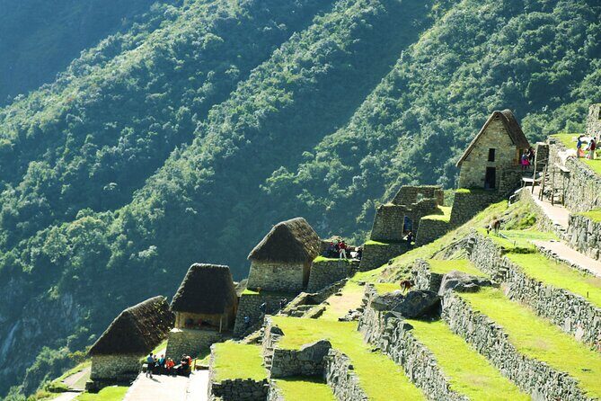 Inca Trail hike 4 days to Machu Picchu with panoramic Train - Day 4: Sun Gate sunrise, a guided Machu Picchu walk, and the way back