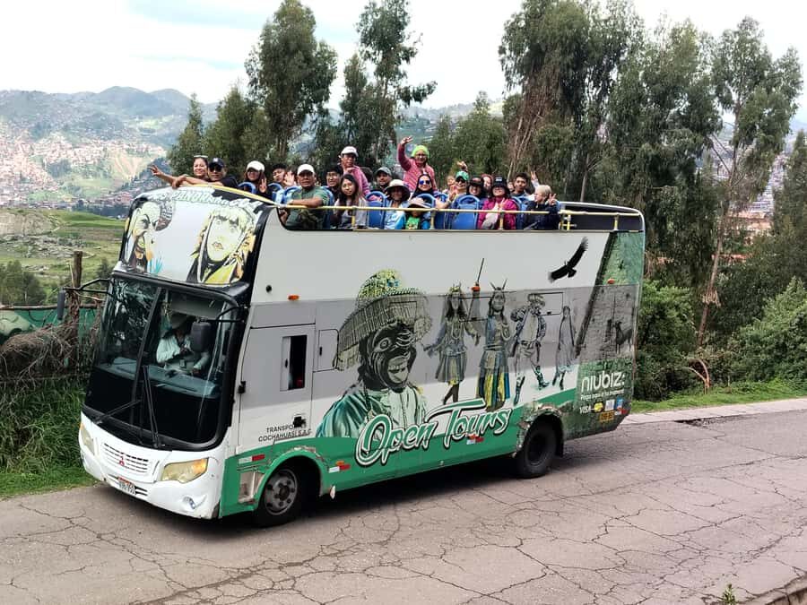 Open-top bus in the city of Cusco, 3-hour tour with panoramic views - The ritual at Llaullikasa: Payment to the Earth with translation support
