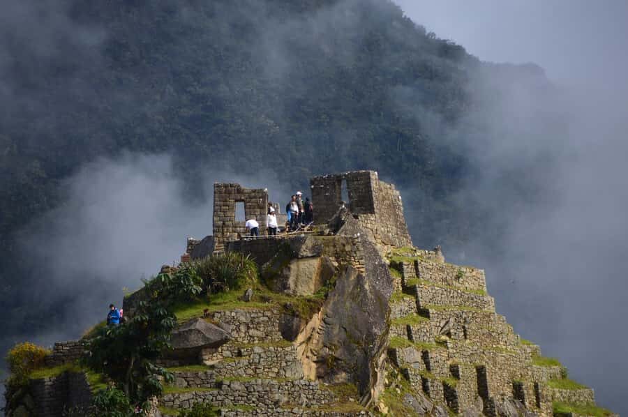 Sacred Valley & Machu Picchu by Train: 2-Day, 1-Night Tour - Pisac Inca site and Pisac Market: terraces you can read, and shopping time